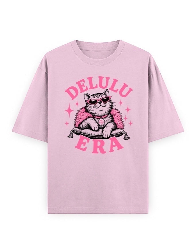 Frolic Saga Unisex oversized classic t-shirt in pink, 100% cotton with a graphic of a cat wearing sunglasses and a pink fluffy boa.