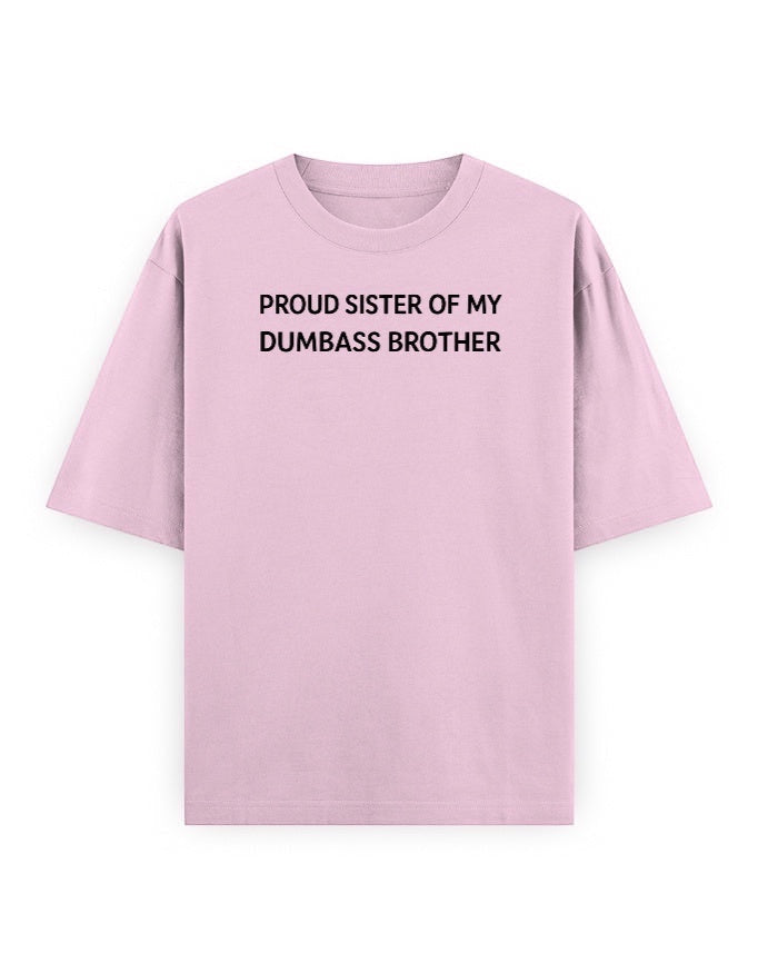 Frolic Saga light pink oversized 100% cotton t-shirt with black text reading "Proud Sister Of My Dumbass Brother"