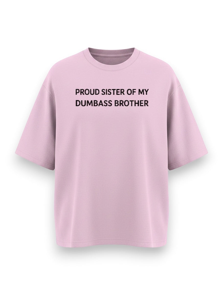 Frolic Saga light pink oversized 100% cotton t-shirt with black text reading "Proud Sister Of My Dumbass Brother".