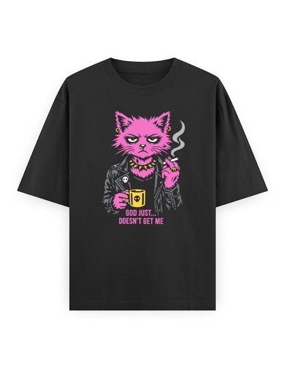 Frolic Saga black oversized cotton t-shirt with a punk graphic of a pink cat smoking and holding a mug, text reads "God Just... Doesn't Get Me."