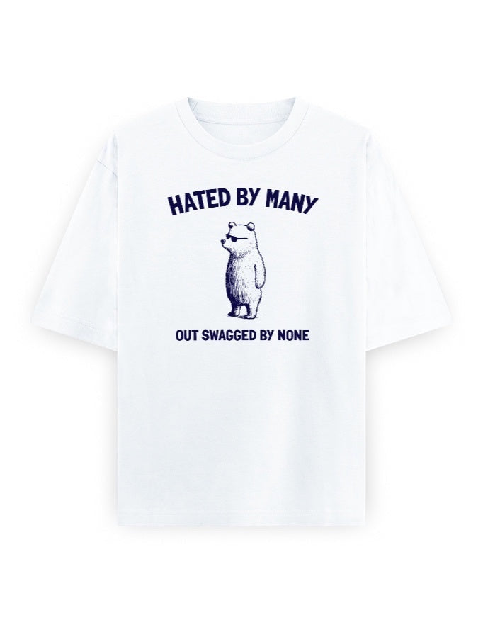 Frolic Saga white 100% cotton oversized t-shirt with vintage sketch bear graphic and text "HATED BY MANY, OUT SWAGGED BY NONE."
