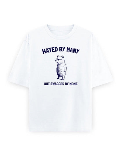 Frolic Saga white 100% cotton oversized t-shirt with vintage sketch bear graphic and text "HATED BY MANY, OUT SWAGGED BY NONE."