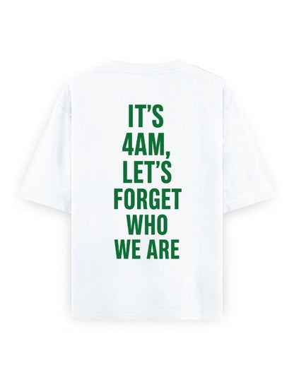 Frolic Saga white 100% cotton oversized t-shirt with green text graphic on back reading "IT'S 4AM, LET'S FORGET WHO WE ARE".