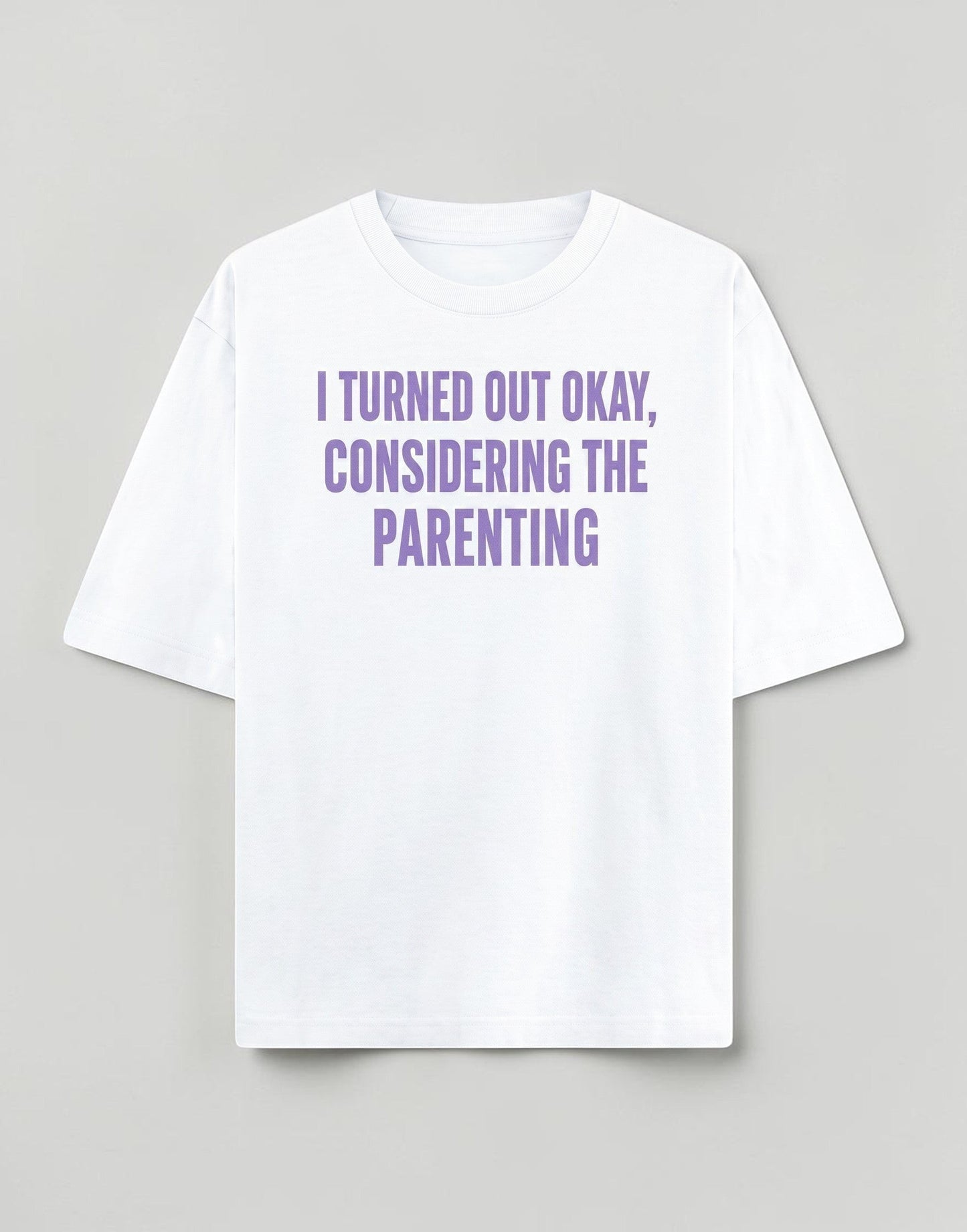 Frolic Saga white heavyweight cotton unisex oversized t-shirt with purple I Turned Out Okay Considering The Parenting text