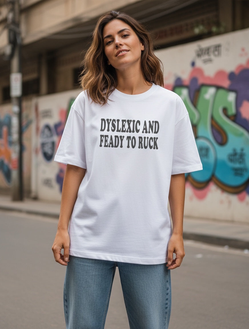 Frolic Saga white 100% cotton unisex oversized t-shirt with black text graphic