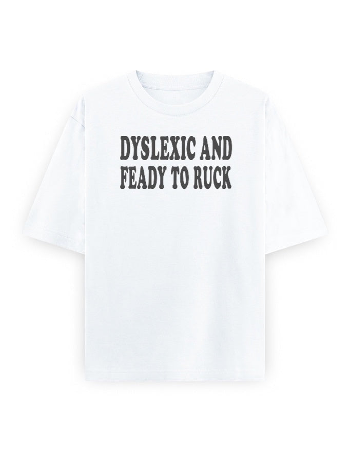 Frolic Saga white 100% cotton oversized t-shirt with 'DYSLEXIC AND FEADY TO RUCK' graphic print.