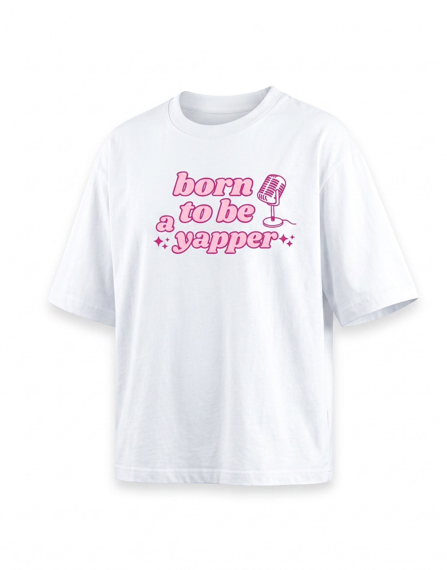 Frolic Saga white 100% cotton oversized t-shirt with pink "born to be a yapper" graphic and microphone design.