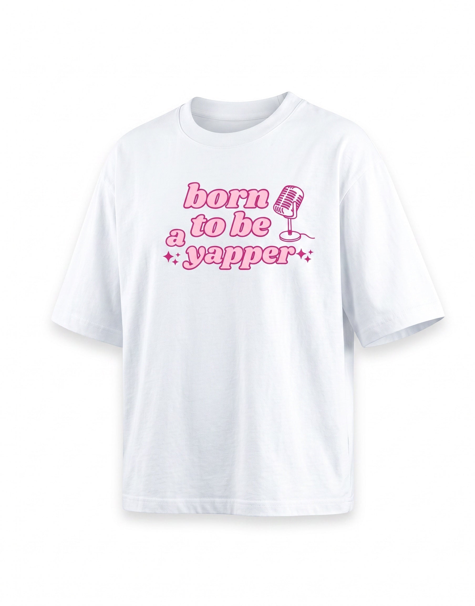 Frolic Saga white 100% cotton oversized t-shirt with pink "born to be a yapper" graphic and microphone design.
